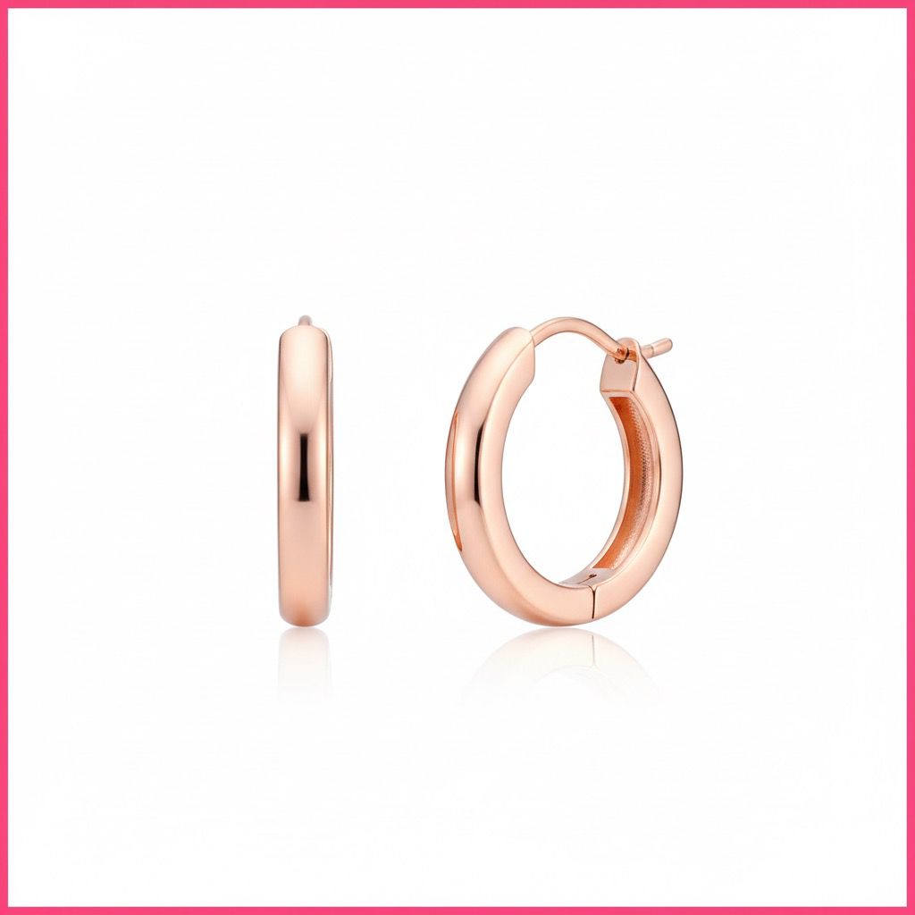 Rose gold hoop earrings on a white background